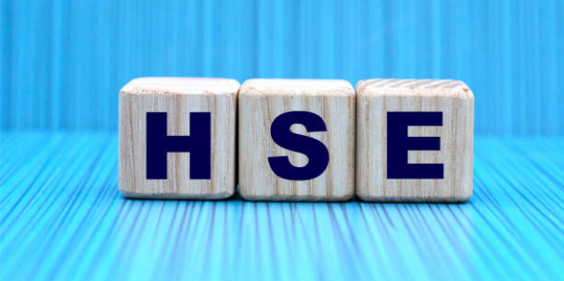 the concept of the word HSE on cubes on a blue background in a stripe